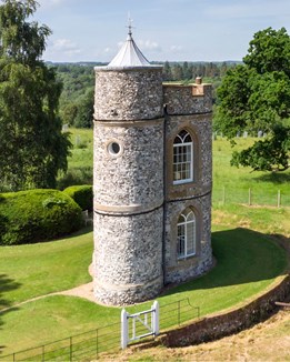 A tower surrounded by fields