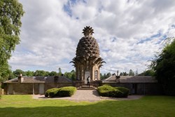The Pineapple ext rear with man 1200x800