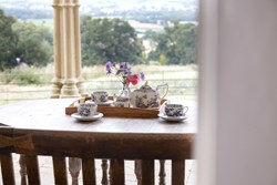 Robin Hood's Hut Umbrello tea outdoors 1200x80