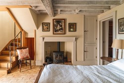 Warren House bedroom with stairs 1200x800