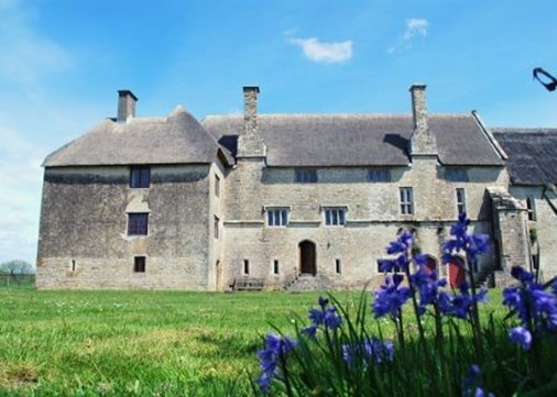 woodsford-castle-exterior-bluebells-listdisplay-450x321