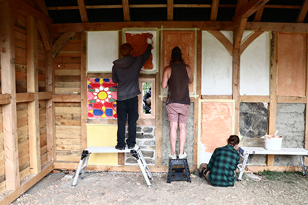 Calverley Old Hall SWAP week 6 - terracotta limewashing panels in the timber-framed building